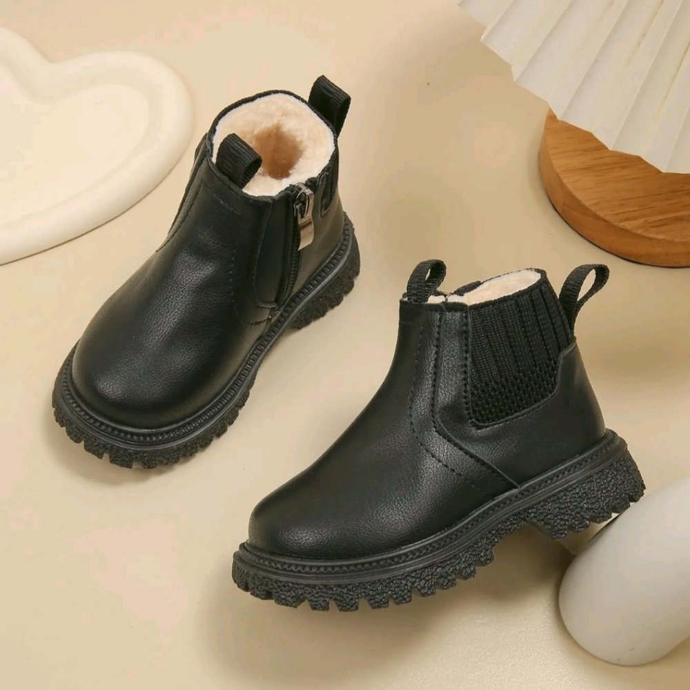 Little girls black leather winter boots. Casual warm ankle boots